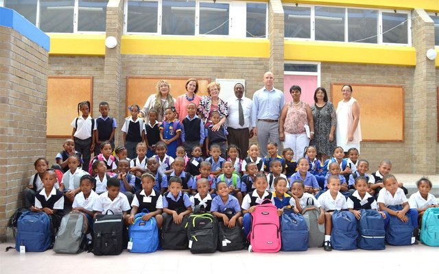 Captured with the three grade-one classes at Mount Pleasant Primary, the recipients of a stationery-filled backpack are: Back row - Lianda Beyers-CronjÃ© (Ward 4 Councillor), Ann Wright (Manager: Sustainable Futures Trust), Executive Mayor Nicolette Botha-Guthrie (Overstrand Municipality), Mattie Hull (Principal: Mount Pleasant Primary School), Michael Cardo (MP: Shadow Minister of Economic Development) and Deborah Wehr, Helen Steneveld and Edith Appollis (Grade One Teachers: Mount Pleasant Primary School).